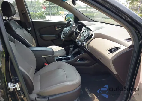 2013 Hyundai Tucson Limited z USA, uszkodzony, nr VIN KM8JU3AC6DU588824